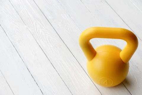 Yellow dumbbell Stock Photos