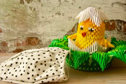 A yellow Easter cute chicken made by paper Stock Photos