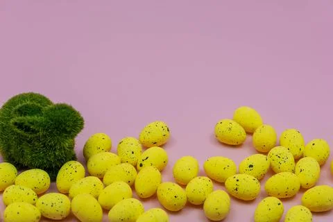 Yellow Easter Egg with freckles pattern and Rabbit Bunny on Pink Background 스톡 사진