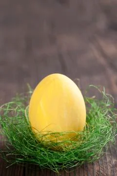 Yellow easter egg Stock Photos