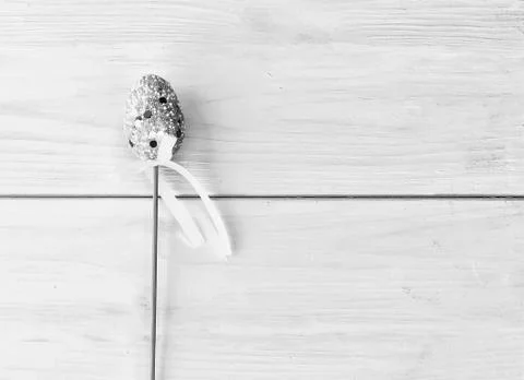 Yellow easter egg on a white wooden background. Stock Photos