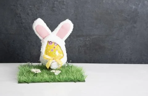Yellow egg with bunny ears, easter symbol Stock Photos