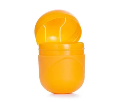 Yellow egg toy capsule Stock Photos