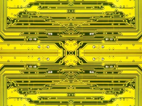 Yellow electronic microcircuit.background. Stock Photos