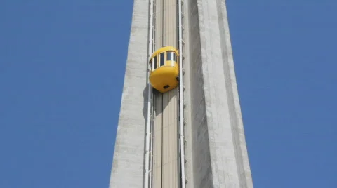 Yellow elevator &amp; modern tower. Vídeos de archivo 735267