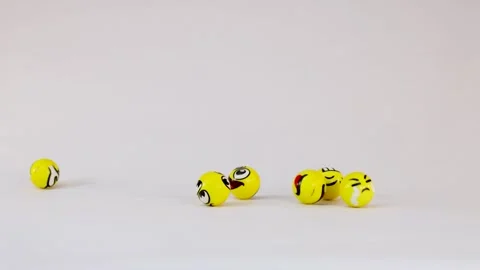 Yellow Emoji Balls Falling and Bouncing on a White Background 스톡 동영상 328280995