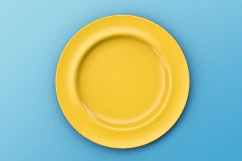 Yellow empty plate on a blue table. Looks like the sun in the sky. Top view イラスト素材