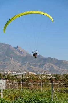 Yellow engine driven paraglider Stock Photos