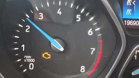 Yellow engine icon on car instruments Stock Footage 254807036