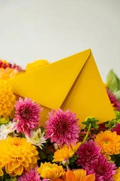 Yellow envelope gift present idea Flower delivery Autumn Fall Bouquet for Stock Photos