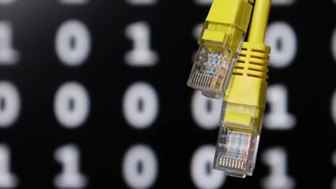 Yellow ethernet cable connectors with binary code background Stock Footage 337789360