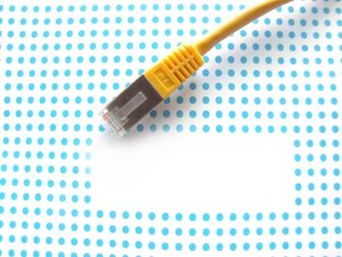 Yellow ethernet cable on dotted background 스톡 사진