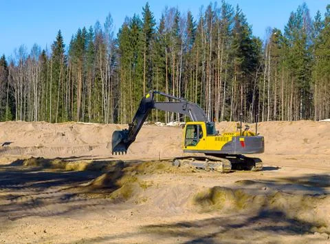 Yellow Excavator at Work Stock Photos