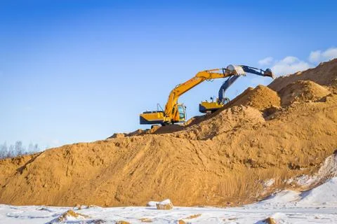 Yellow excavator at work Stock-Fotos