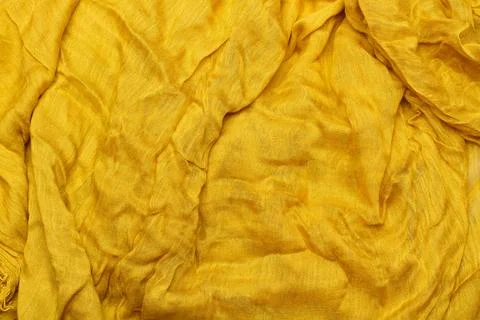 A yellow fabric texture in a close up view Stock Photos