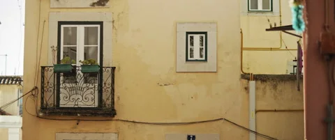 Yellow facade of an old building Stock Footage 151396307
