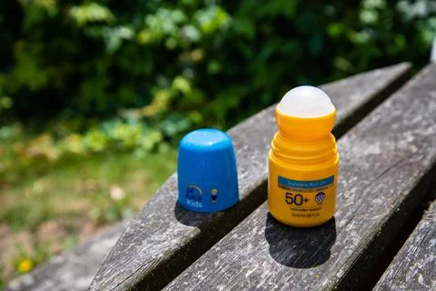 Yellow factor 50+ roll-on sunscreen Stock Photos