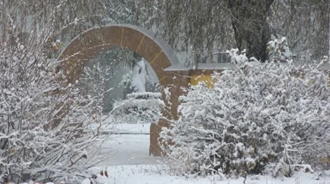 Yellow fence covered snow Stock Footage