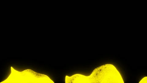 Yellow fields of particles rise from the bottom of the screen.Atmospheric Stock Footage 98979613