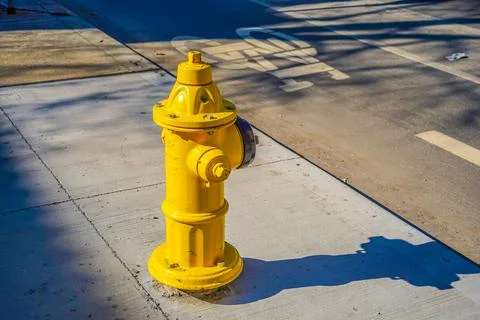 Yellow fire hydrant Stock Photos