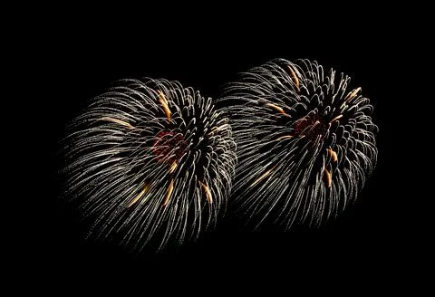 Yellow firework sparkling on black background for celebration Stock Photos
