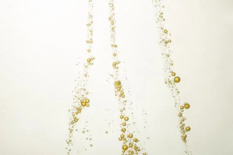 Yellow fizz bubbles Stock Photos