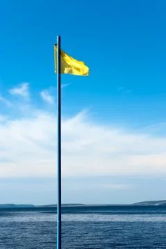 Yellow flag in the sky Foto stock