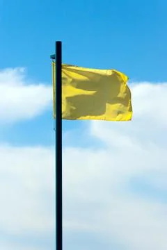 Yellow flag in the sky 库存照片