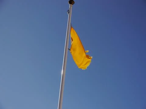Yellow flag sky Stock Photos