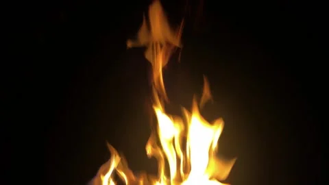 Yellow flames on black background. Strong fire on black background. Beautiful Stock Footage 312802948