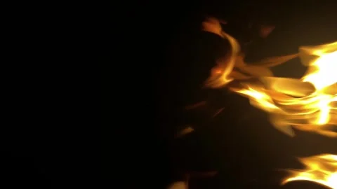 Yellow flames on black background. Strong fire on black background. Beautiful Stock Footage 313754373