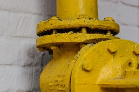 Yellow flanged connection Stock Photos