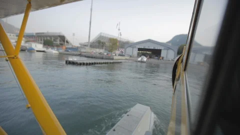 Yellow floatplane in floating in the Lake como. View from the plane Video stock 127823523