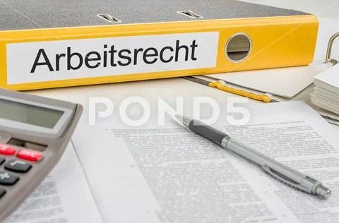 Yellow folder with the german label Arbeitsrecht - Labour Law Stock Photos