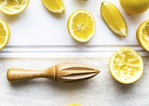 Yellow fresh cut organic lemons Stock Photos