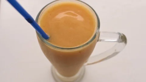 Yellow Fruit Shake in a Glass Video stock 74334920