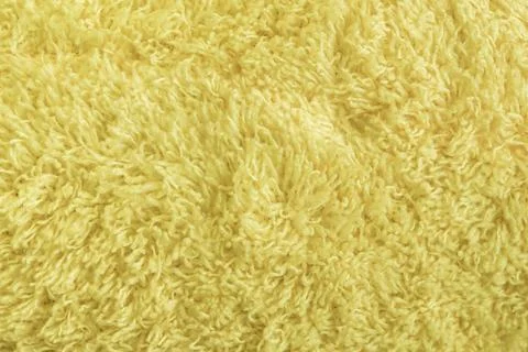 Yellow Fur of fabric surface texture Fotos Stock