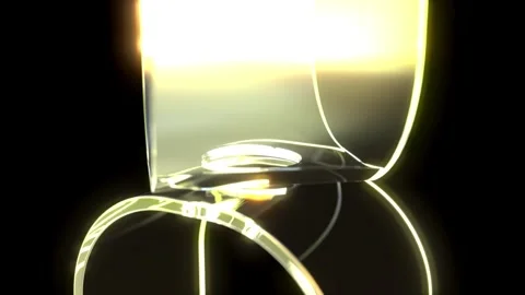 Yellow glass on black bg able to loop endless Stock Footage 314967919