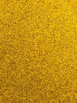 Yellow glitter texture background with sparkling pattern Stock Photos