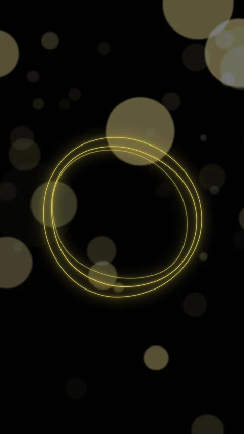 Yellow glowing circle bokeh soft ring light, dark black space, floating blur dot Stock Footage 340576775