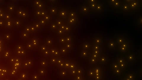 Yellow glowing particles sparkle in the dark 스톡 동영상 304833083