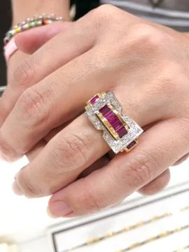 Yellow gold ruby ring with white diamonds 스톡 사진