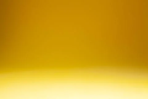 Yellow gradient background with room for text or image, abstract background. Stock Photos