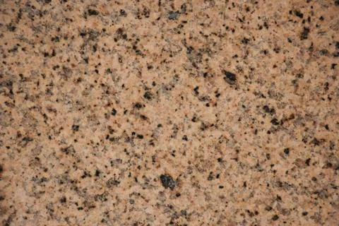 Yellow granite texture Stock Photos