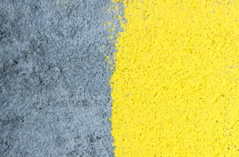 Yellow gray wall background. Abstract concrete textured wall background. Stock Photos