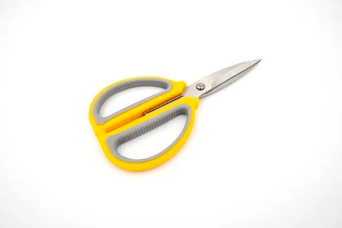 Yellow grey handle scissors isolate on white background. Paper, art, multipur Stock Photos