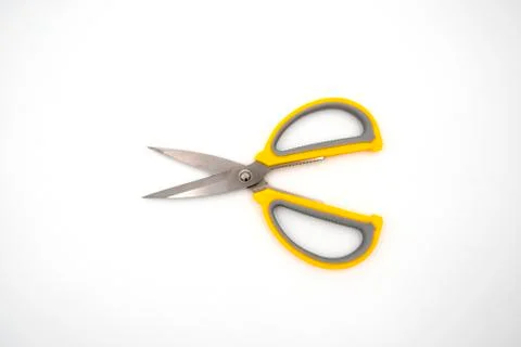Yellow grey handle scissors isolate on white background. Paper, art, multipur Stock Photos
