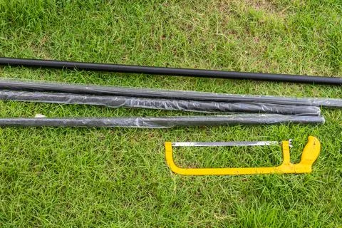 A yellow hacksaw Stock Photos