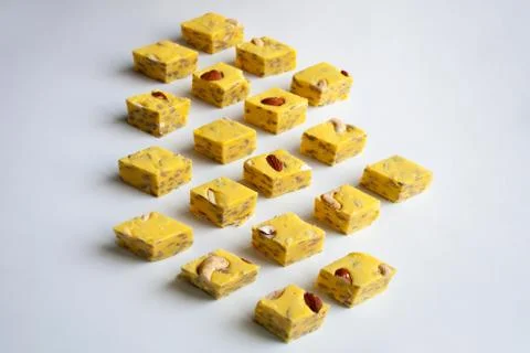 Yellow halva pieces cube pattern Stock Photos