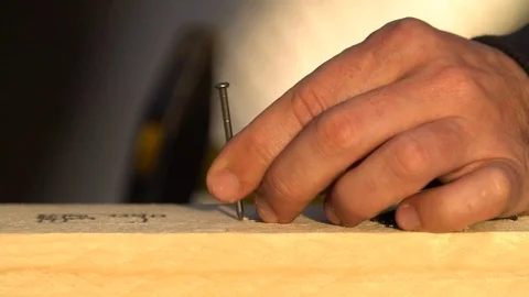 Yellow Hammer clogs the nail in slow motion Vídeos de archivo 83327058
